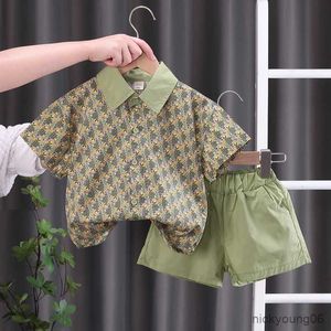 Set di abbigliamento 2023 Estate Fratello Sorella Abiti Boy Kid Flower Camicia casual + Pantaloncini 2 pezzi Set di fiori per ragazza