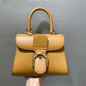 Novo delvo brilhante colorblock portátil ferradura fivela envoltório cabeça camada bolsa feminina venda 60% de desconto na loja online