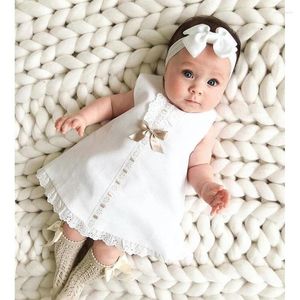 Flickaklänningar Spädbarn född baby spetsklänning ärmlös bowknot rib solid vit skift klänning pannband