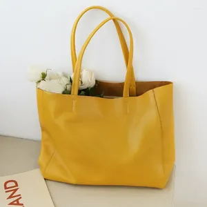 Axelväskor 2024 sommar stor kapacitet handväska för kvinnor äkta läder tygpåse mjuk kohud fast färg casual shopping shopping
