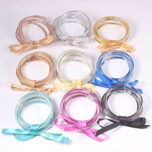 Set di 5 nastri, tubo in silicone da donna in polvere d'oro monocromatica, colore gelatina trasparente, braccialetto con fiocco carino, gelatina