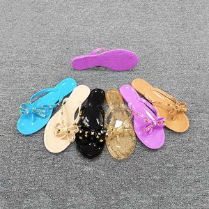 HBP Non-Brand billige Schmetterlings-Sommerneue Damen-Slipper mit klaren Perlen, flache Nieten, Gelee-Sandalen, Flip-Flops für Damen