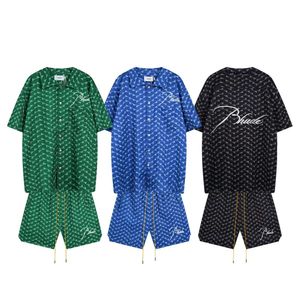 男性と女性のRhade Summer New High Street Embroidered Letterルーズカジュアル半袖シャツデザイナースタイルトレンドカジュアルスーツ