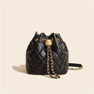 Lingge Chain äkta läder kvinnor mini hink kohud liten design sense axel crossbody handväska försäljning 60% rabatt butik online