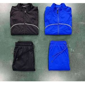 2024 Куртка Trapstar Спортивный костюм Мужской костюм Irongate Shell Версия 2.0 Синий и черный 1to1 Качественная вышитая надпись Женское пальто Размер XS-XL nhj556