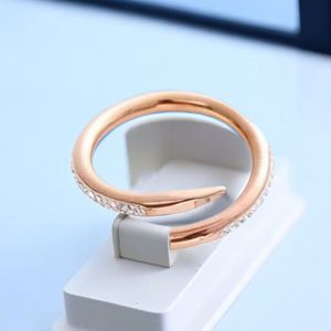 Highly polished luxury simple love ring necklace earrings gold and silver rose color stainless steel couple rings fashionable womens designer sets wholesale