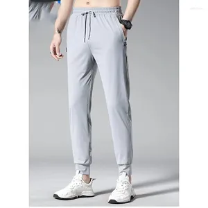 Calças masculinas 2024 verão casual solto oversized minimalista cor sólida versátil cintura alta rendas até gelo seda estilo fino leggings para homens