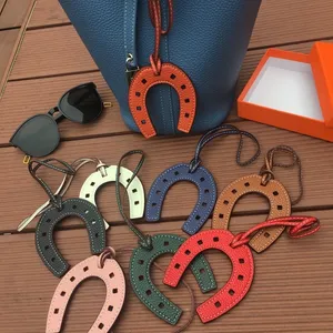 Classic Designer Keychain Horseshoe Bag Pendant Platinum Bag Pendant Top grade Leather Vegetable Basket Pendant Car Pendant Keychain