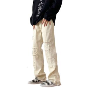 Designkänsla nödställda burr kant jeans för män, höst och vinter nödställda, tvättade high street löst raka breda benbyxor