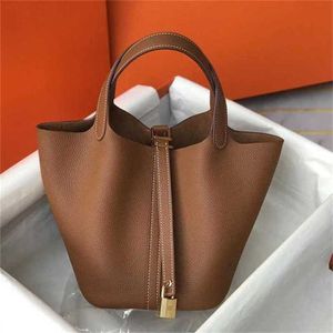 High End Quality Leather Handbag Bucket Litchi Mönster Toppskikt Kraft Vegetabilisk korg Kvinnor 70% rabatt