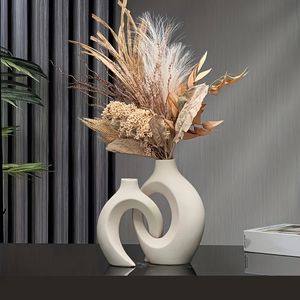 Pusty Nordic Modern Ceramic Wazon Zestaw 2 dla nowoczesnego domu Deformern BOHO Hollow Flower Vases for Living Room Showshelf 240311