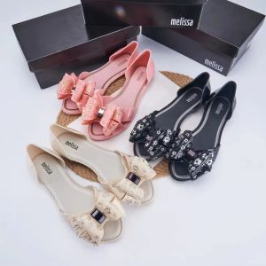 Sandalen 2023 Melissa Neue Frauen goldplattierte Bogenfischmund Sandalen Modische Mädchen hohl flache Sohle einzelne Schuhe Ladies Beach Schuhe