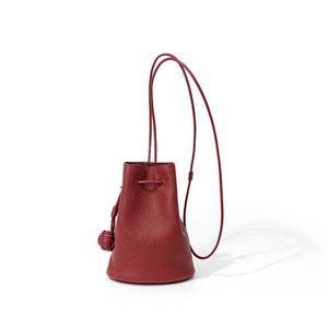 Borse a tracolla Borsa a secchiello con coulisse di nicchia coreana 2024 Nuova tracolla in pelle Instagram da donna Minimalista Strato superiore Spalla in pelle di vacchetta 240318