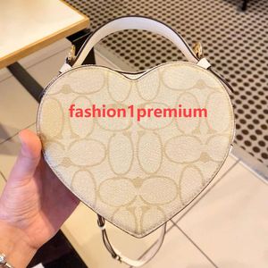 Toppkvalitet Tote Crossbody Evening Sacoche Heart Bag Clutch Saddle äkta läderdam Luxury Handväskor Designer Bag Womens Purs Mens Vintage Sling Axel Påsar