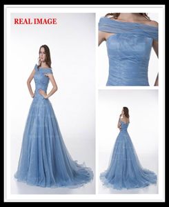 2015 Tendenza moda Ritratto Abiti da ballo Pieghettato Bling Organza Abiti da sera Corte dei treni MZ0084521082