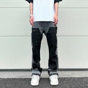 Męskie dżinsy 2023 Graffiti Black Flear Dżinsowe spodnie z łatami Hip Splashed Ink Spodnie szerokie nogi Spodnie Slim Fit For Men