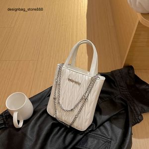 Ucuz Toptan Sınırlı Boşluk% 50 İndirim Çantası Pileli Küçük Kare Çanta Yaz Yeni niş zinciri üst düzey hissi tek omuz crossbody