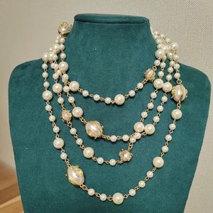 Gioielli coreani con pendente a catena lunga con collana di perle a doppio strato per la festa delle donne 240305