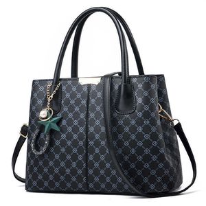 Kvinnors handväska stor kapacitet Retrotryck Splicing Shoulder Bag 032424-11111