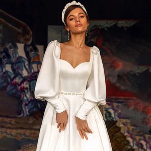 Modest Satin A Line Long Sleeves Wedding Dresses with Pockets Sweetheart Backless Sweep Train Vestido de Noiva Bridal Gowns YD