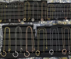 Nagelhänge designer halsband varumärke bokstav halsband smycken män kvinnor 18k guld pläterade kopparkedjor kristall hänger mode bröllop födelsedag present