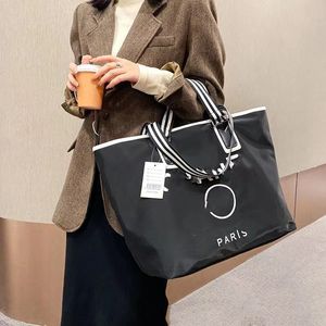 Classics Designer Shopping bags New Large capacity Nylon women's spring and summer beach vacation Shoulder Fashion commuter Tote Bag