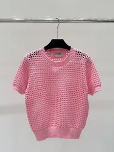 Gratis frakt 2024 Svart/vit/rosa O -hals Korta ärmar Håliga ut kvinnor stickor tröja designer kort kvinnor tröja 3187