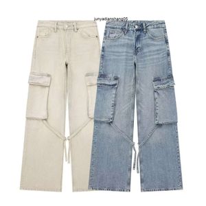 Vind kvinnors arbetsstil mitt stigande jeans vår nya raka benbyxor länge