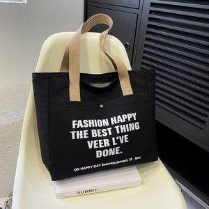 Enkelhet Mångsidighet stor kapacitet Canvas Bag nisch design pendling väska japansk koreansk instagram axelväska student ryggsäck 240315