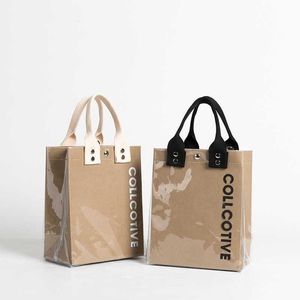 Axelväskor Kraft Paper Bag PVC Transparent Jelly Women S Trendy One Shoulder Casual Handbag Creative Shopping Bento Bag 240318