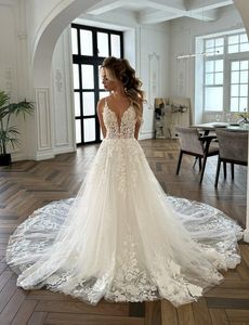 Eleganckie błyszczące koronkowe głębokie paski spaghetti A-line sukienki ślubne bez pleców aplikacje haftowe sukien ślubna można dostosować