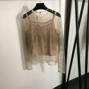 Top da donna sexy trasparenti T-shirt in rete a maniche lunghe T-shirt camicetta con strass glitterati con canottiere foderate