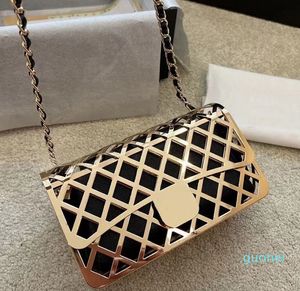 Designer -Gold Metal Diamond Lattice Frame Chain Shoulder Ryggsäck Kvinnor Single Shoulder Makeup Bag