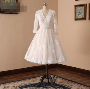 Abito da sposa vintage anni '50 in tulle pizzo champagne corto da sposa con maniche a 34 lunghezza tè plus size scollo a V abito da sposa Custo7775515