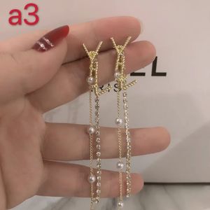 Kvinnors designerörhängen Kvinnors designer Ivjewelry örhängen Alla hjärtans dag gåva engagemang Designer smycken