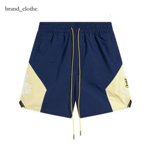 RHUDE Homens Respirável Praia Shorts Homens Mulheres Casual Malha Faixa Respirável Oversize Rhude Shorts Cintura Shorts Com Cordão Frete Grátis para Shorts Preto e Branco 7075