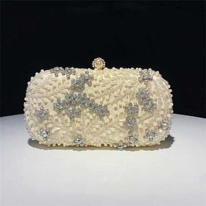 Top Shoulder Bags Handheld Designer Handbags Tote Banquet Bag Handmade Beaded Embroidered Womens Evening Clutch 240311