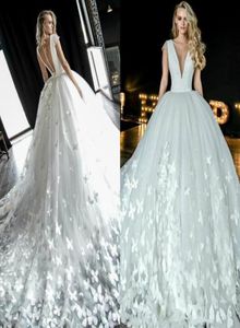 2021 Abito da sposa linea A con scollo a V maniche ad aletta Romantico applicazioni di farfalle Abiti da sposa in tulle con bottoni trasparenti Abiti posteriori4942644