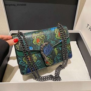 Cross-border atacado marca de moda bolsas bolsa feminina nova moda cabeça bloqueio textura impressa pequena alça de corrente quadrada um ombro crossbody