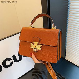 Corporate Women's Bags Factory 50% Discount Promotion Brand Designer Handbags Hot Womens Bag New Fashion Lock Buckle Small Square Straddle Handheld