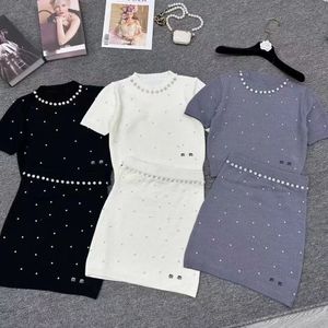 24SS Designer Ladies Luxury Knitted Diamond T-shirt + Hip Wrap Skirt Classic Letter knitted dress Fashion Luxury two-piece Wrap hip half skirt two-piece set