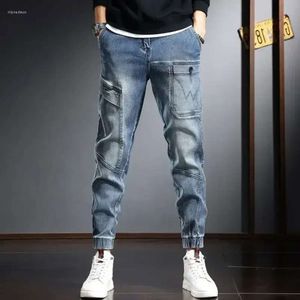 Mäns jeansbyxor harem skarvade manliga cowboybyxor för män last haruku baggy staplad av sommaren original denim koreansk stil xs