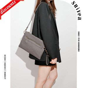 Przechowuj wysokiej jakości torbę projektową Spring Nowy ręcznie robiony tkaninowy edycja modna koperta wielopoziomowa multi funkcjonalna kobietę crossbody