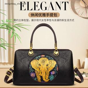 Borse di moda di marca al dettaglio all'ingrosso Borsa a mano nuova borsa da donna a tracolla disegnata a mano in stile cinese Mamme versatili etniche
