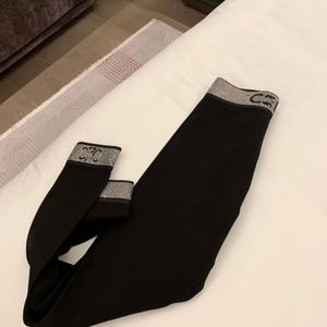 Tunica aderente a vita alta dal design di lusso con strass patchwork logo lettera modello pantaloni lunghi neri leggings SML
