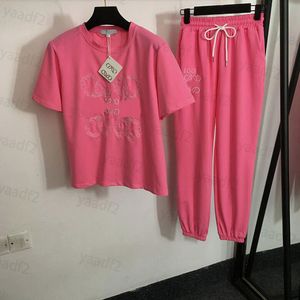 Kvinnor som joggar med två delar uppsättningar T -skjorta byxor kläder designer brev tryck sportkläder