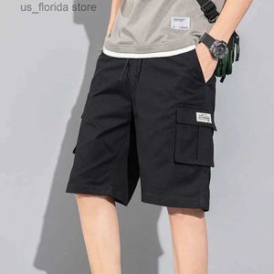 Szorty męskie wiosna letnia odzież robocza Mężczyźni luźne pasujące do nogi Spodnie Spodnie Man Outdoor wiele kieszeni swobodne szorty Y240320