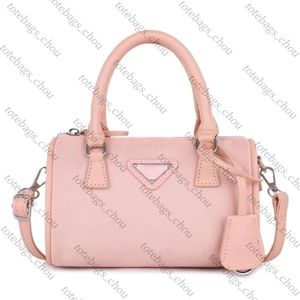 Bolsas de boliche de luxo bolsa de grife p família redonda barril nylon saco feminino saco crossbody handbill of ladle ombro nova rede de rede vermelha casual hopo bucket fábrica venda