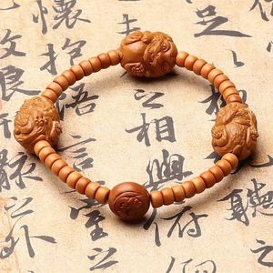 Strand Olive - Lucky Bracelet Iron Core Carved Cute Tiger Hand-Held Nuclear Carving