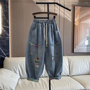 Kvinnors jeans kvinna harem byxor mode gata hip-hop elastiska midja bredben byxor baggy tvättbar bomullshål streetwear joggar